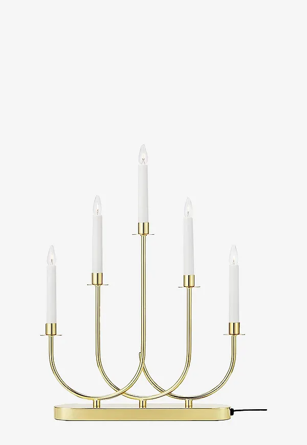 Snygg ljusstake i guld från Markslöjd.