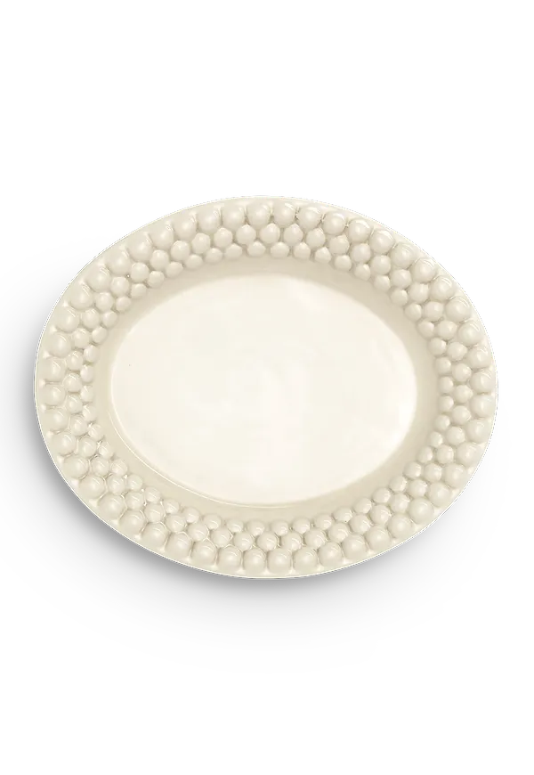 Beige Mateus-tallrik i vacker modell.