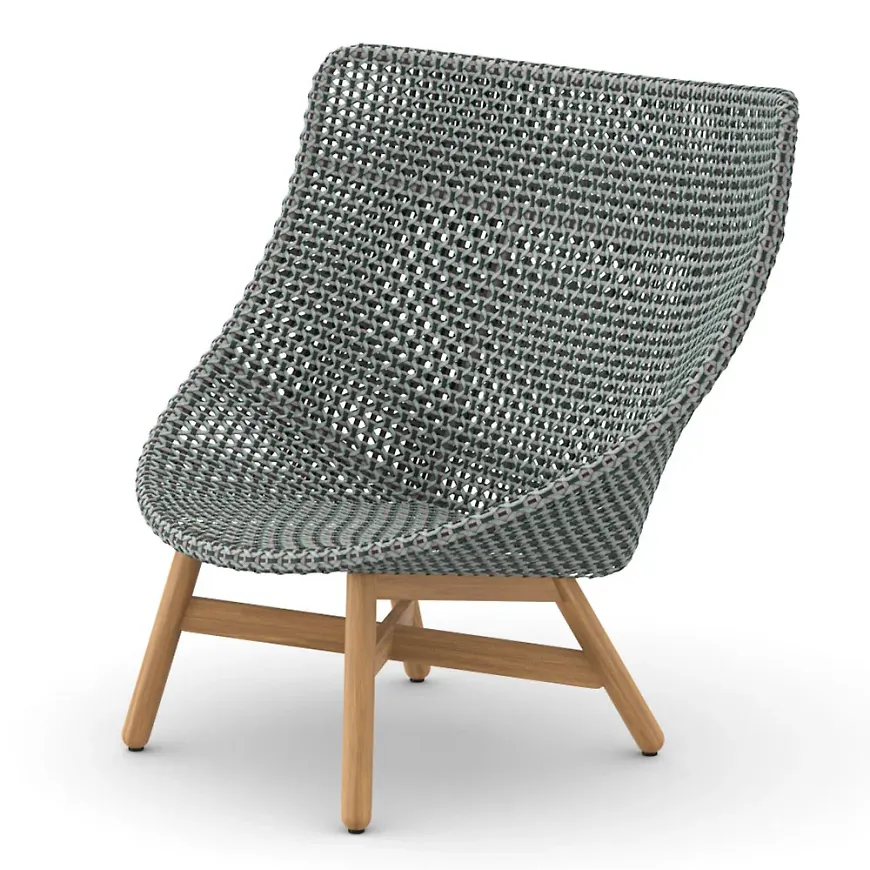 Modern fåtölj i teak från Dedon.