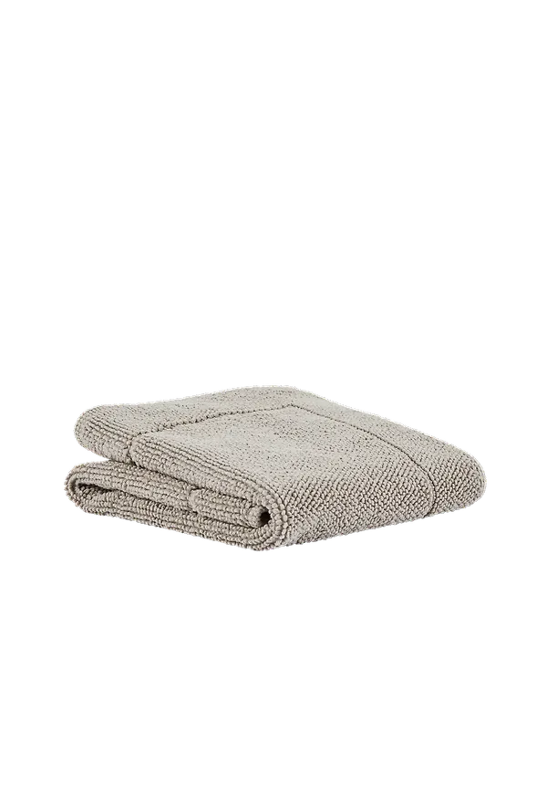 Ljusbrun Mille Notti-badrumsmatta i vacker modell.