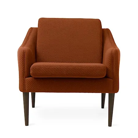 Brun Warm Nordic-fåtölj i ek i moderiktig modell.