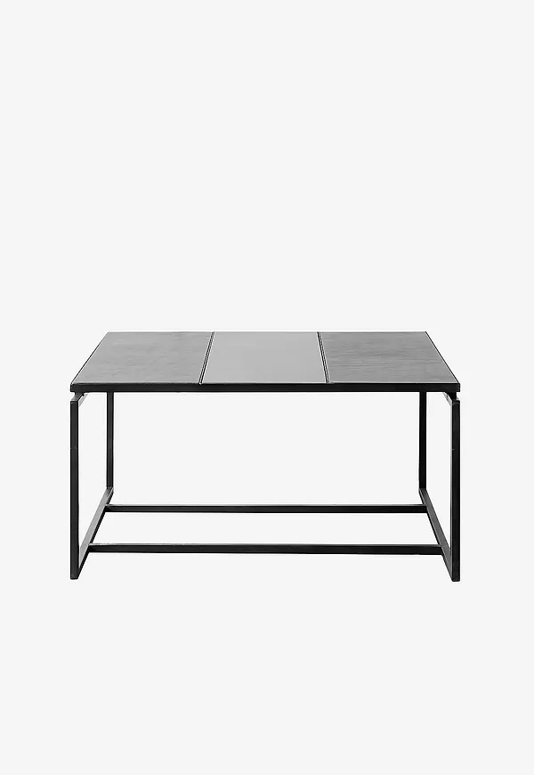 Svart Muubs-bord i moderiktig modell.