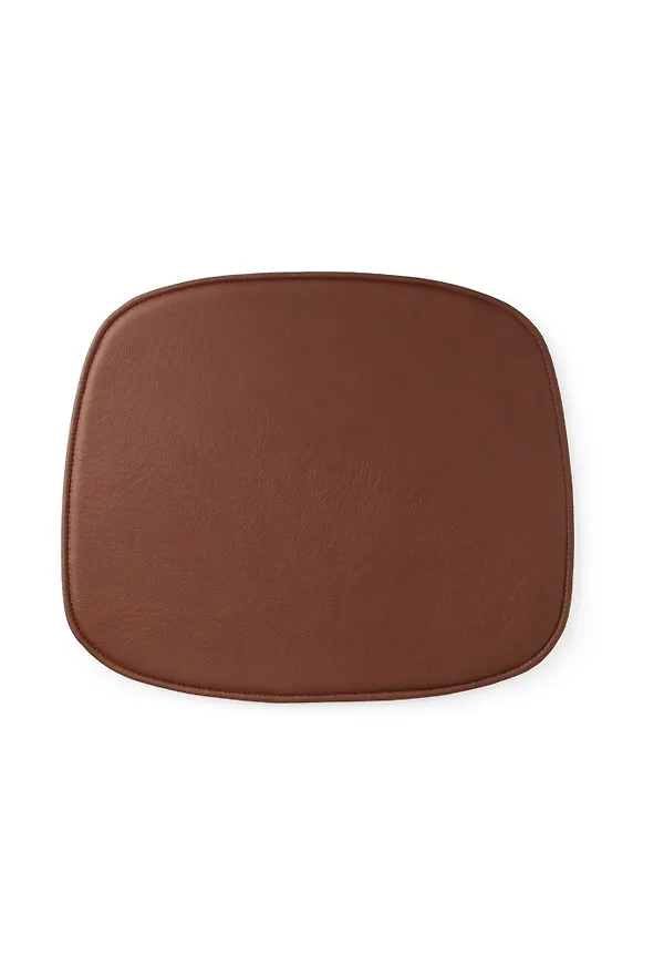 Smickrande sittdyna i läder från Normann Copenhagen.