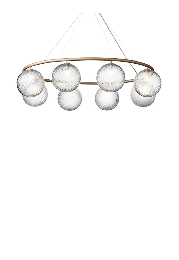 Komfortabel bordlampa i guld från Nuura.