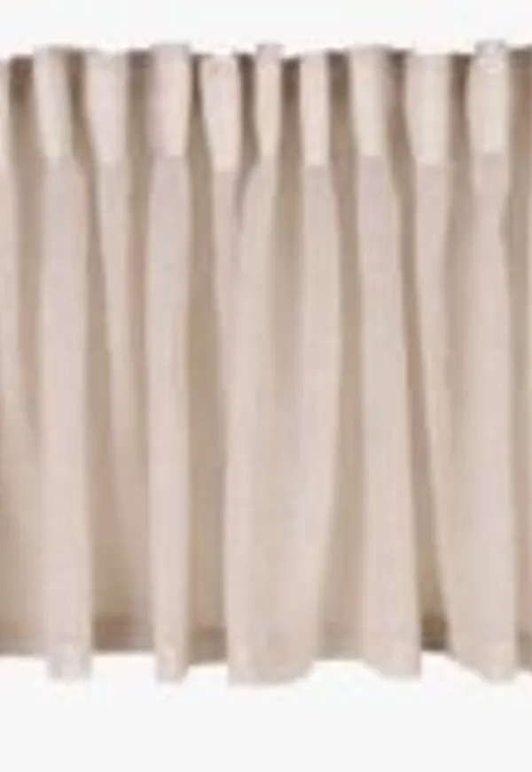 Snygg hemtex gardin i beige färg gjord i linne.