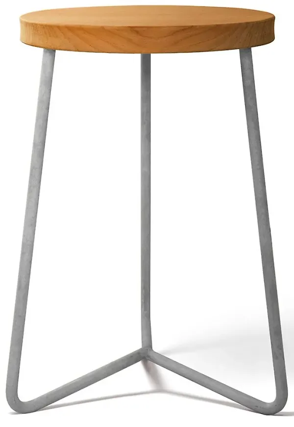 Elegant pall i teak från Grythyttan Stålmöbler.