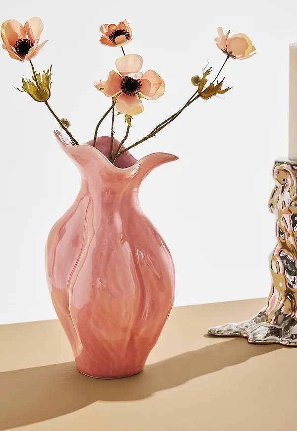Rosa Pastill-vas i mysig modell.