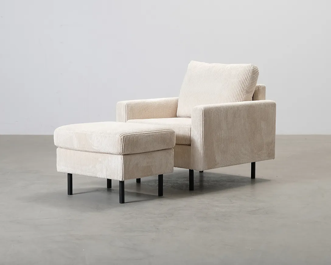 Supersnygg beige fåtölj 2026 från Concept 55.