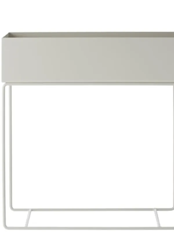 Grå FERM LIVING-sidobord i ikonisk modell.