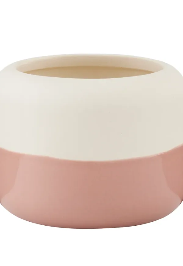 Rosa RIG-TIG-kruka i ikonisk modell.