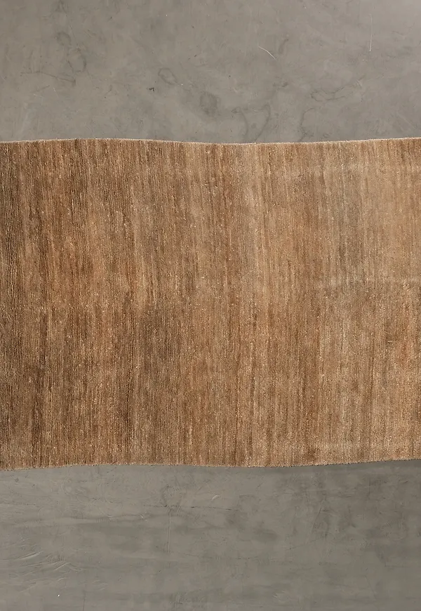 Klassisk matta i brunt från Roots Living.