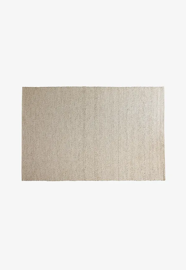 Härlig beige ullmatta 2025 från Rowico Home.