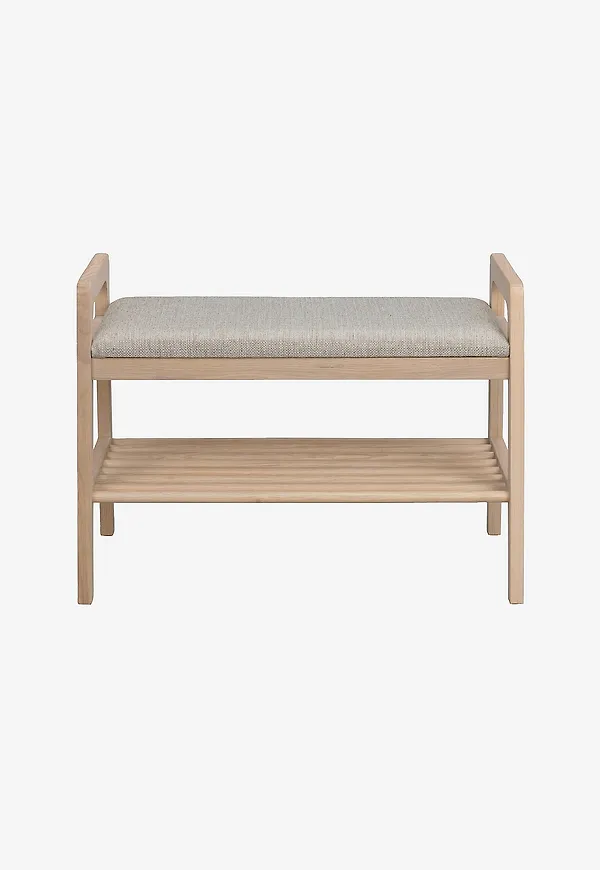 Jättefin bänk i beige färg gjord i ek.
