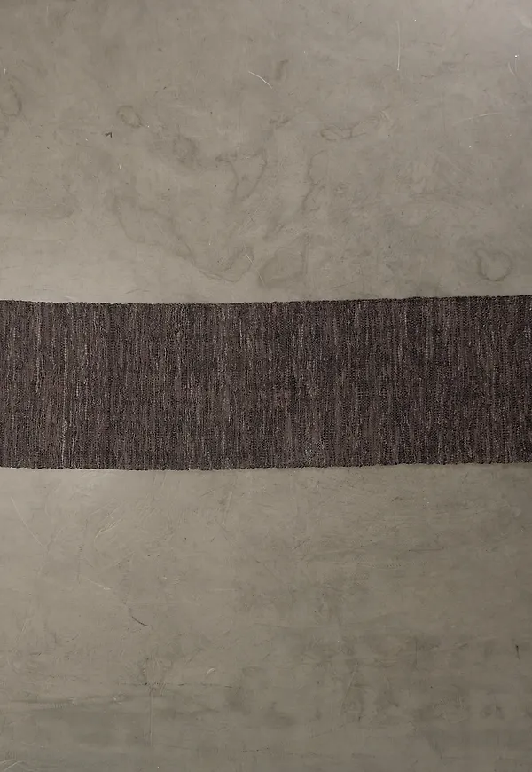 Skön hallmatta i brun färg gjord i läder.