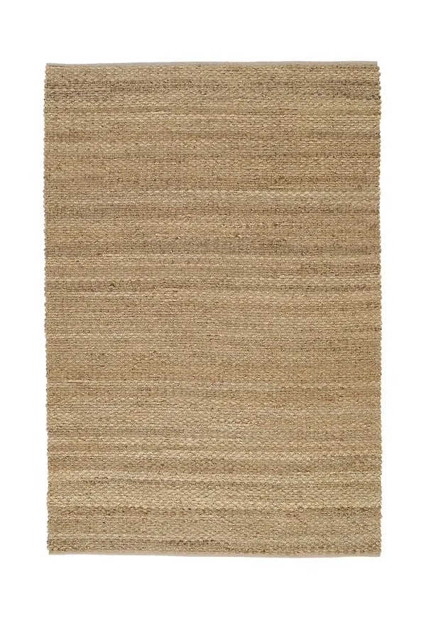 Vacker matta i beige färg gjord i bomull.