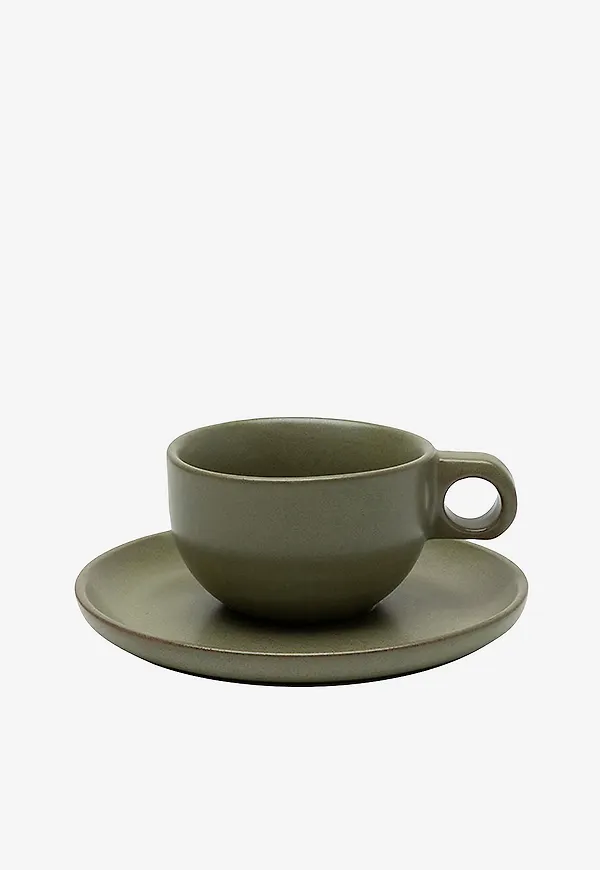 Grön Serax-mugg i snygg modell.