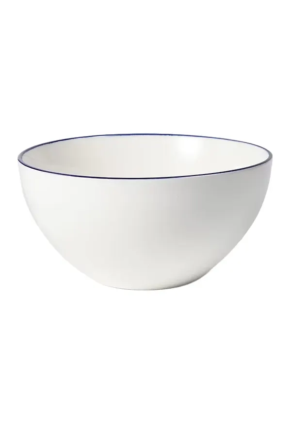 Blå ÅHLÉNS HOME-frukostskål i fantastiskt fin modell.
