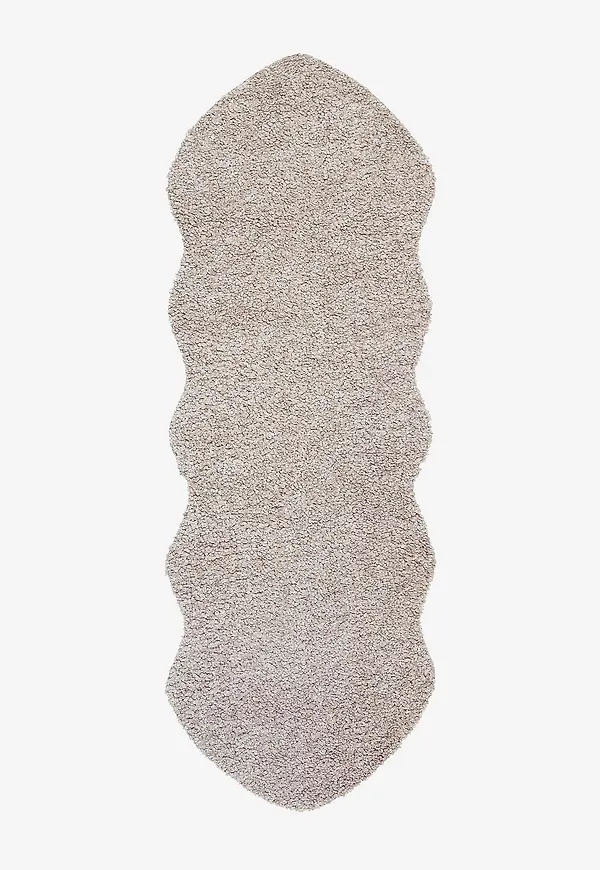 Riktigt fin matta i fårskinn från Skinnwille.