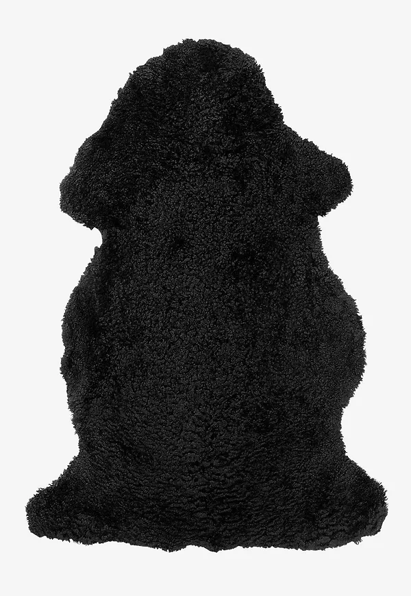 Komfortabel svart matta i fårskinn från Skinnwille.