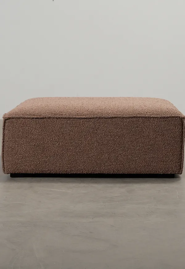 Fantastiskt fin fotpall i brunt från Sofacompany.