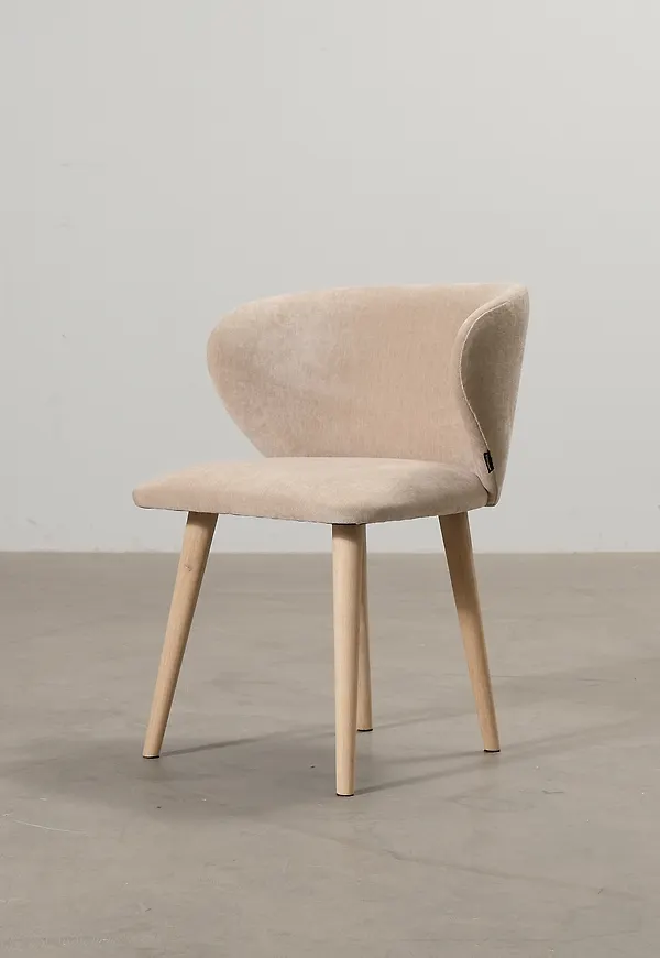 Beige Sofacompany-ekstol i stilren modell.