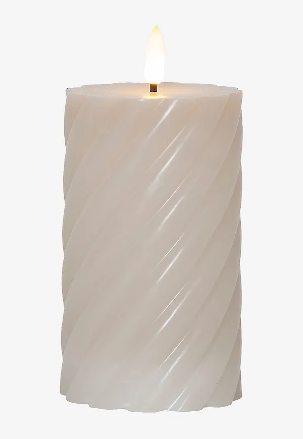 Beige Star Trading-blockljus i stilren modell.