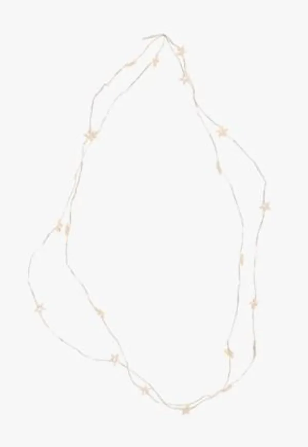 Riktigt trendig silver lampa 2025 från hemtex.