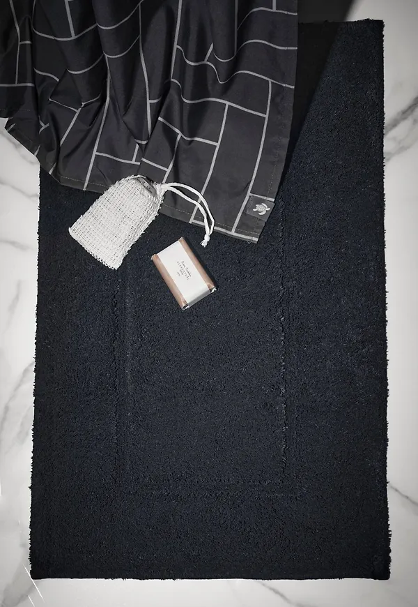 Mörkgrå Staycation-bomullsmatta i riktigt snygg modell.