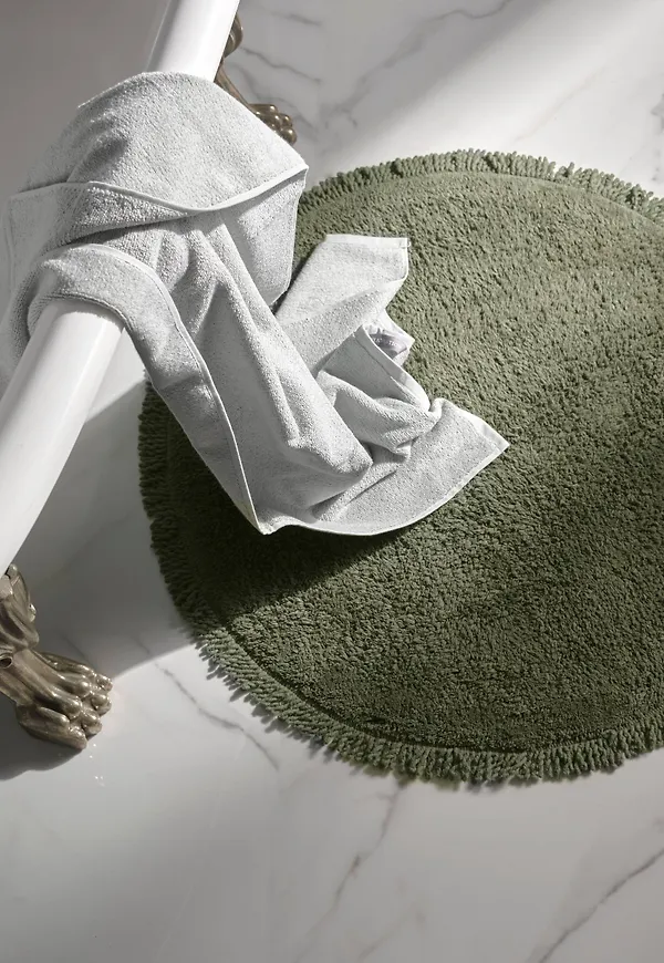 Otroligt snygg bomullsmatta i blågrönt från Staycation.