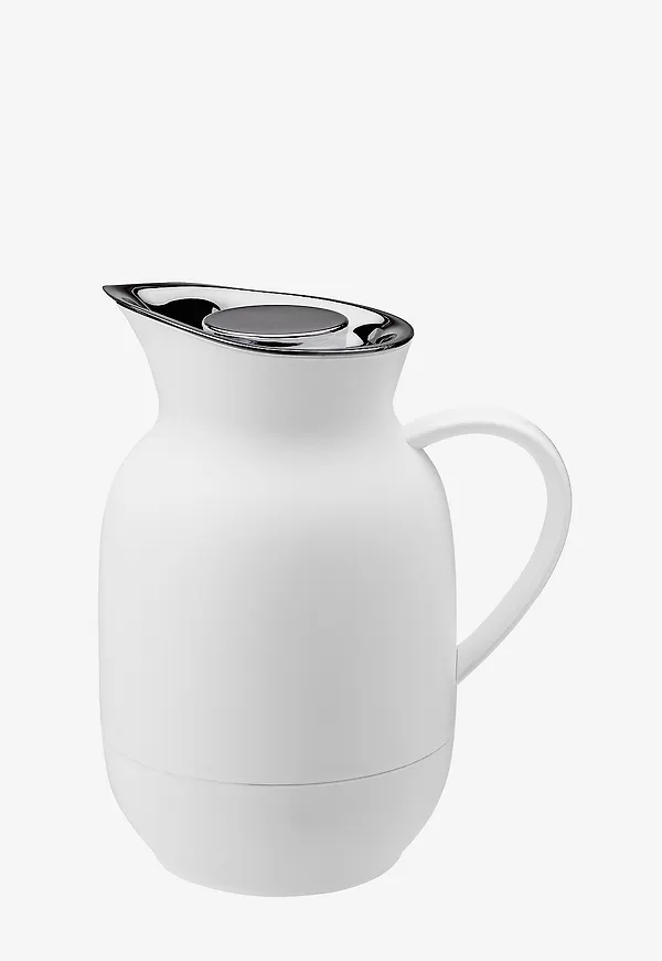 Vit Stelton-karaff i fin modell.