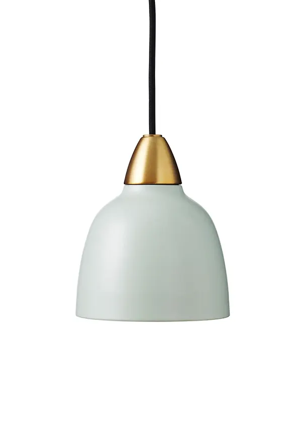 Grön Superliving-lampa i ikonisk modell.