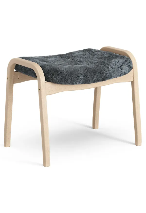 Otroligt fin fåtölj i fårskinn från Swedese.