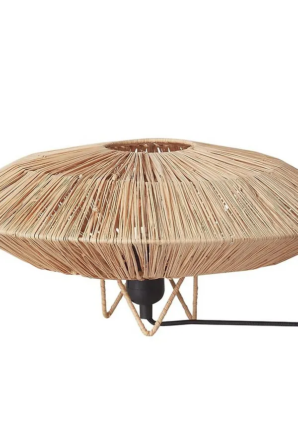 Ikonisk sängbordslampa i beige färg gjord i järn.