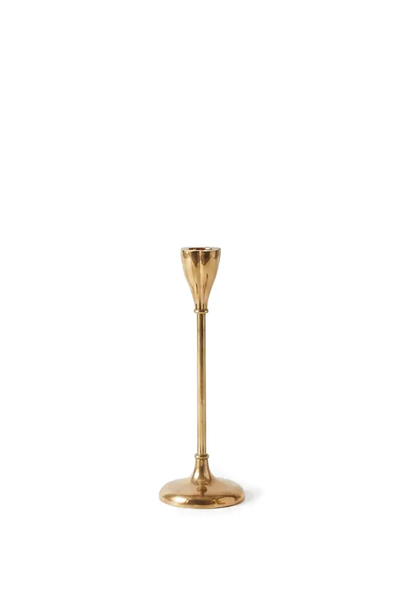 Otroligt snygg ljusstake i guld från Tinted Objects.