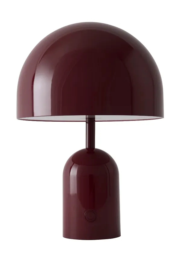 Smickrande bordslampa i rött från Tom Dixon.