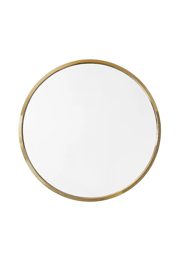 Stilriktig spegel i guld från &Tradition.