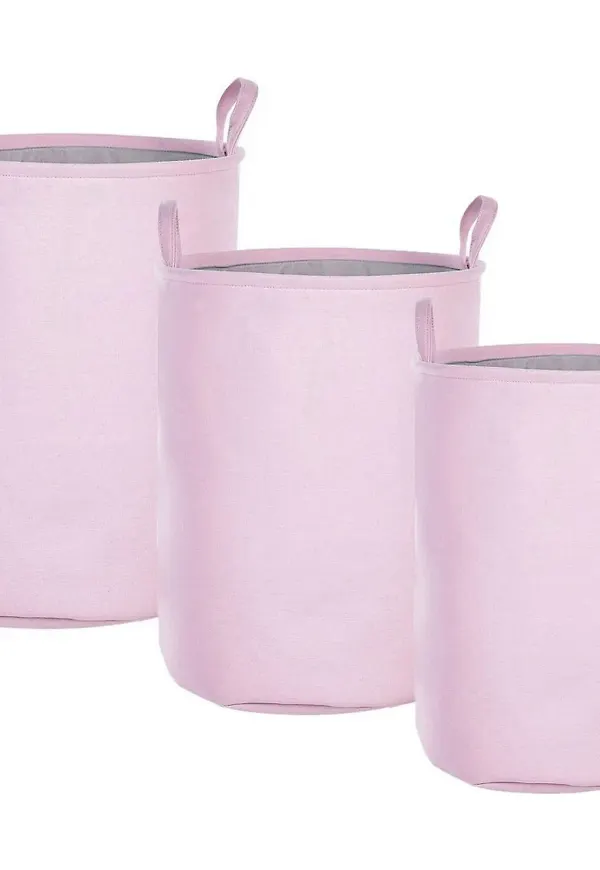 Jättesnygg tvättkorg i rosa färg gjord i bomull.