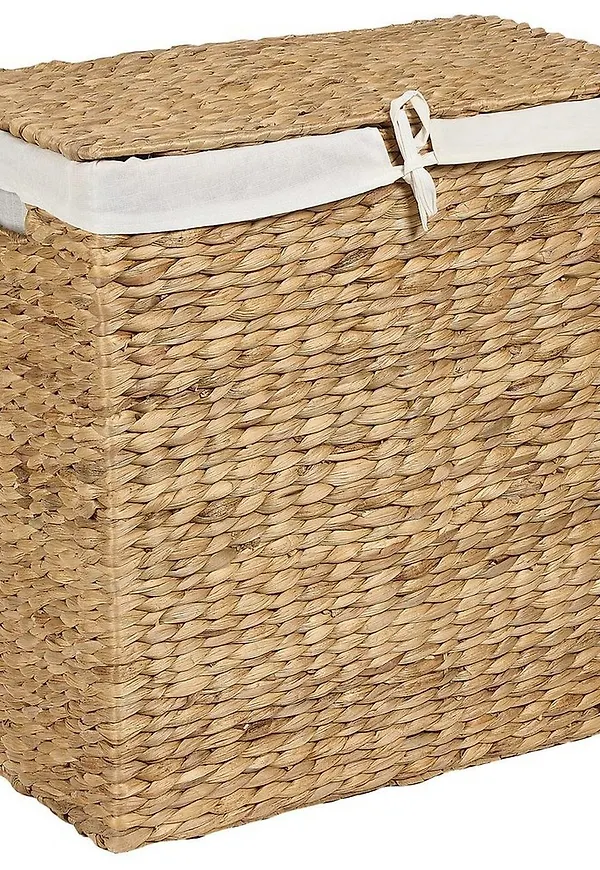 Trendig förvaringskorg i beige färg gjord i bomull.