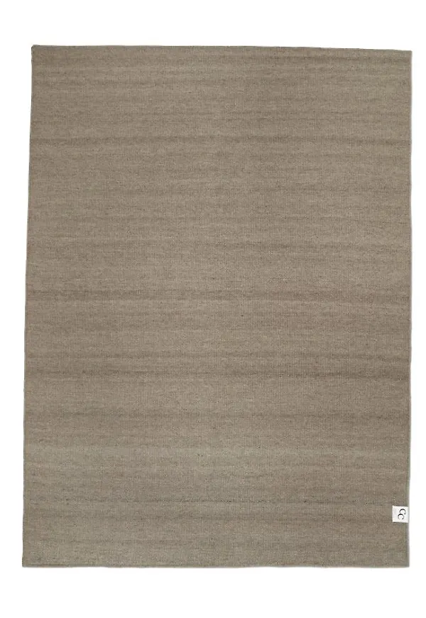 Beige ullmatta som passar perfekt till hösten 2025!