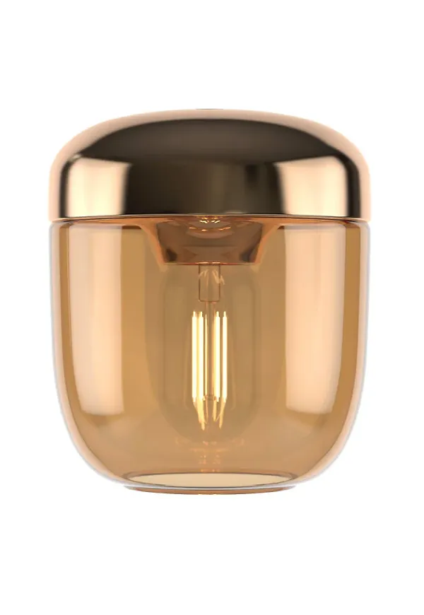 Vacker lampa i gult från UMAGE.