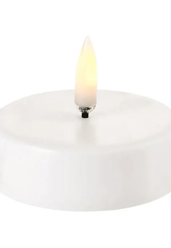 Vit Uyuni Lighting-värmeljus i moderiktig modell.