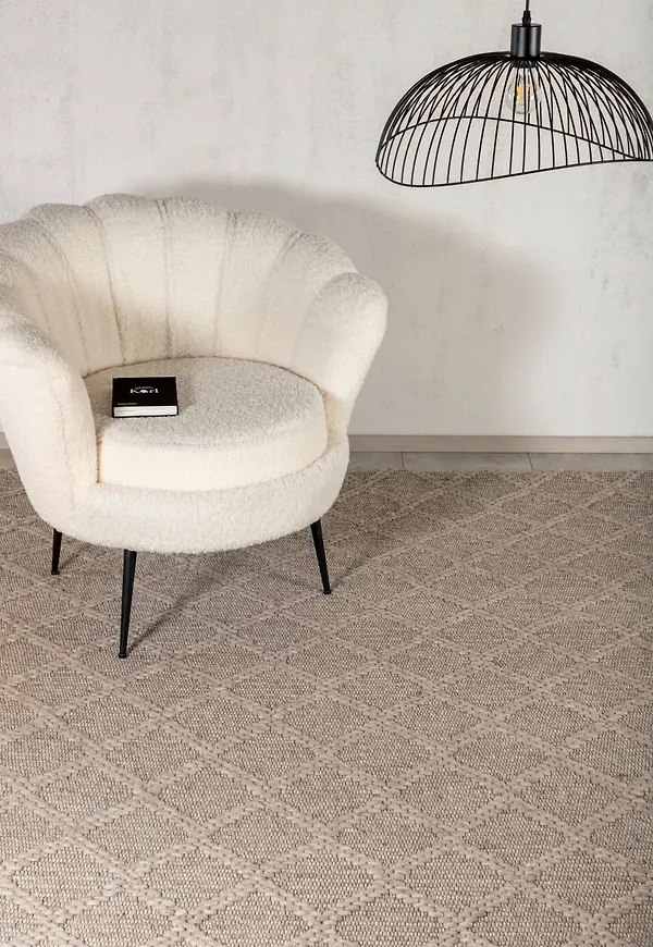 Klassisk venture home matta i beige färg gjord i ull.