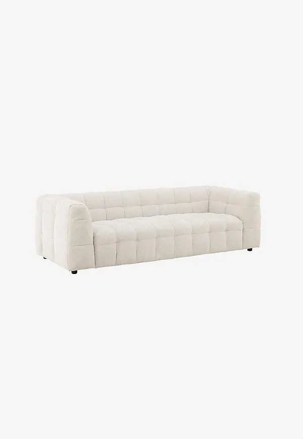 Ikonisk soffa i beiget från Venture Home.