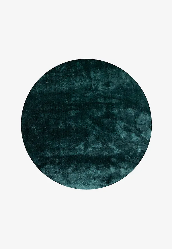 Ikonisk venture home matta i grön färg gjord i bomull.