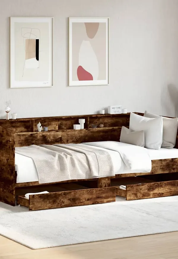 Fantastiskt snygg vidaxl gästsäng i brun färg gjord i ek.