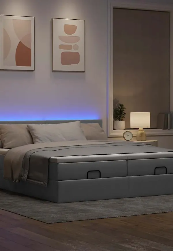 Grå vidaXL-säng i moderiktig modell.