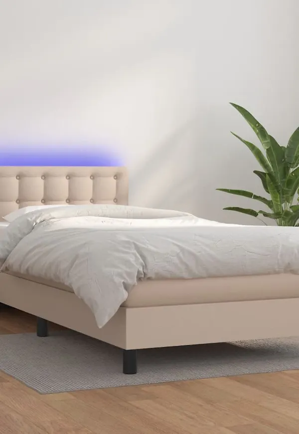 Fantastiskt snygg vidaxl säng i brun färg gjord i bomull.