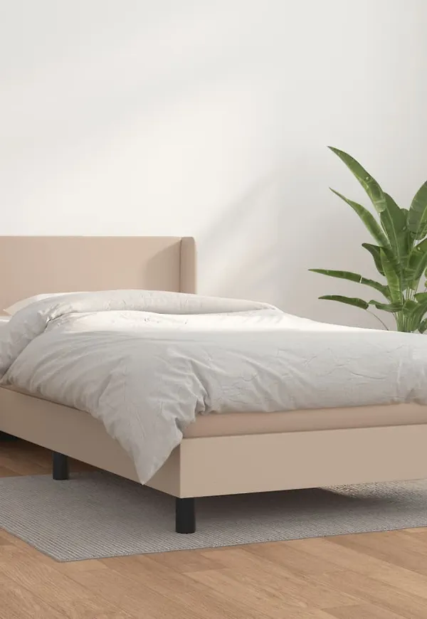 Fantastiskt fin vidaxl säng i brun färg gjord i bomull.