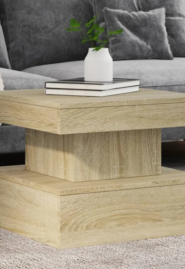 Härlig vidaxl soffbord i brun färg gjord i ek.