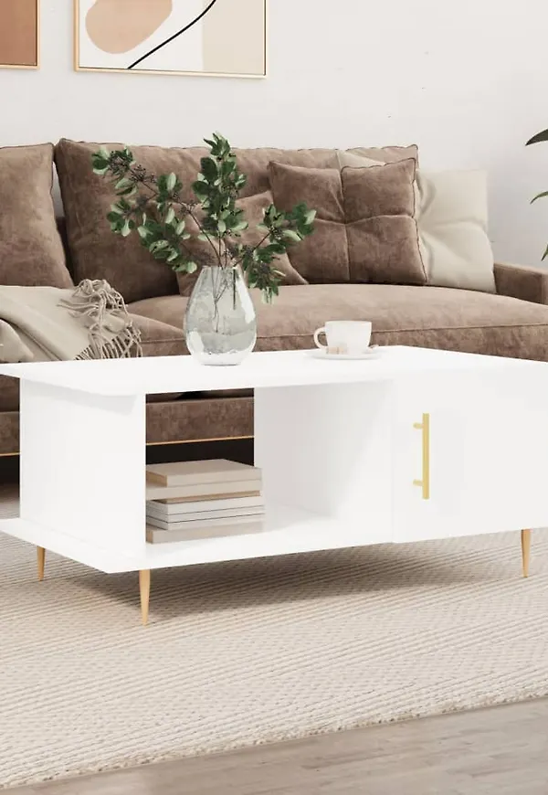 Stilriktig vidaxl soffbord i vit färg gjord i järn.